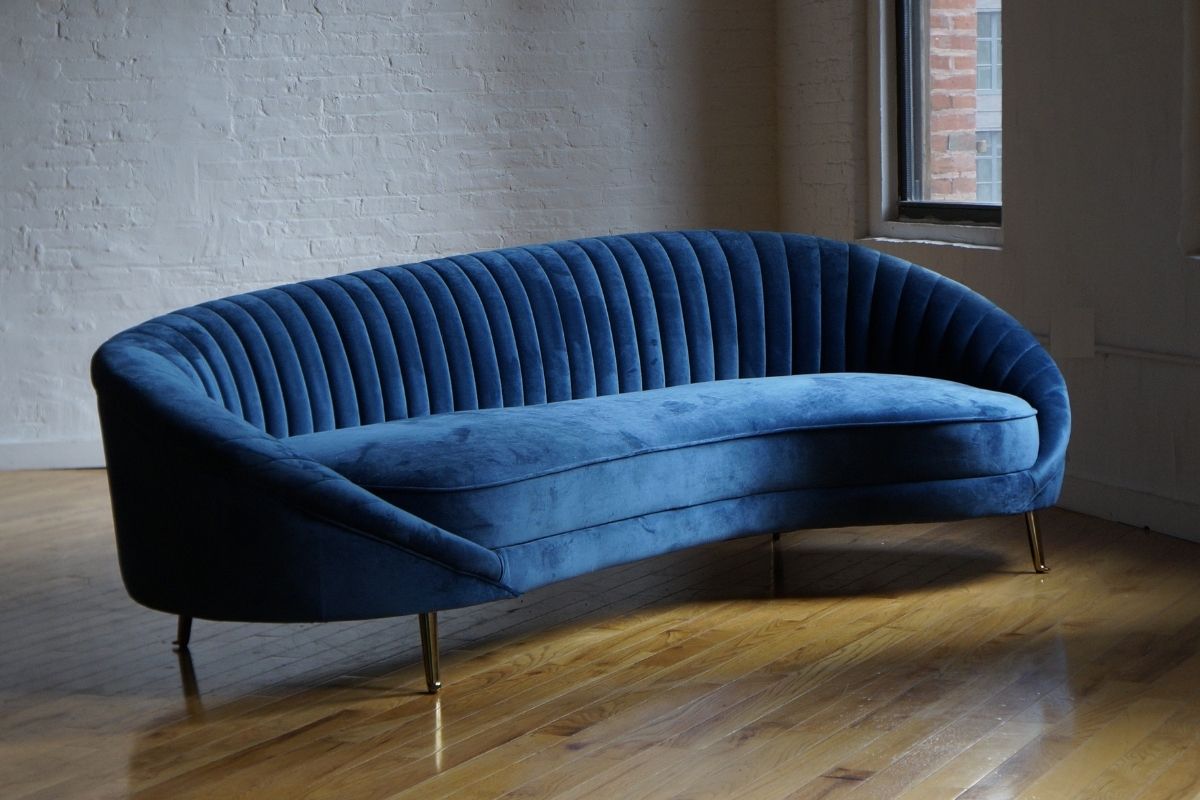 Serpentine mid-century modern sofa in dark blue velvet