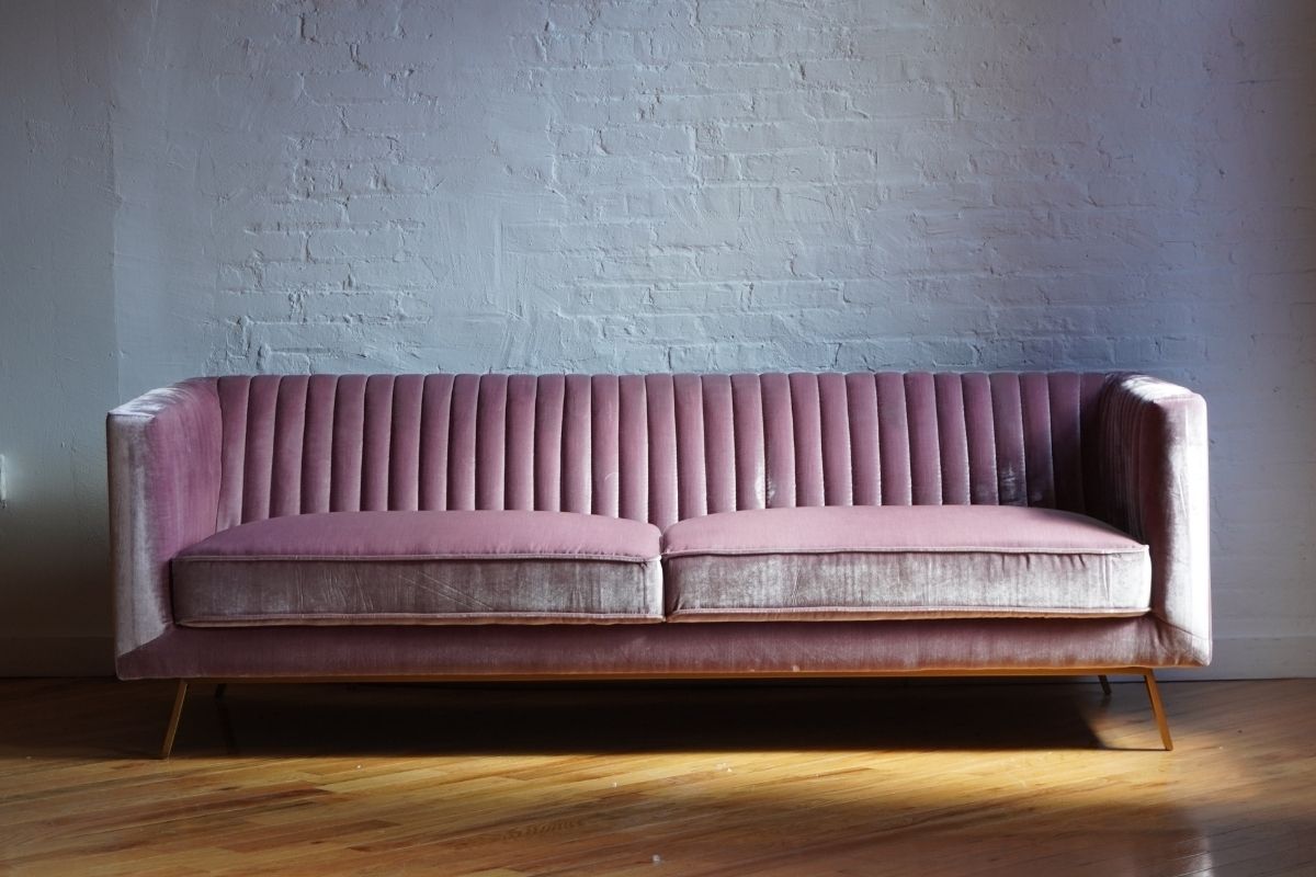 Pink velvet art deco couch