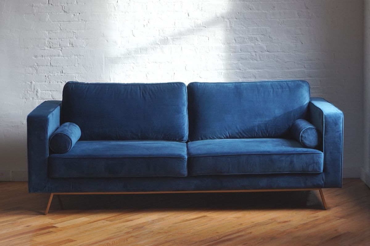 Navy blue velvet mid-century modern couch