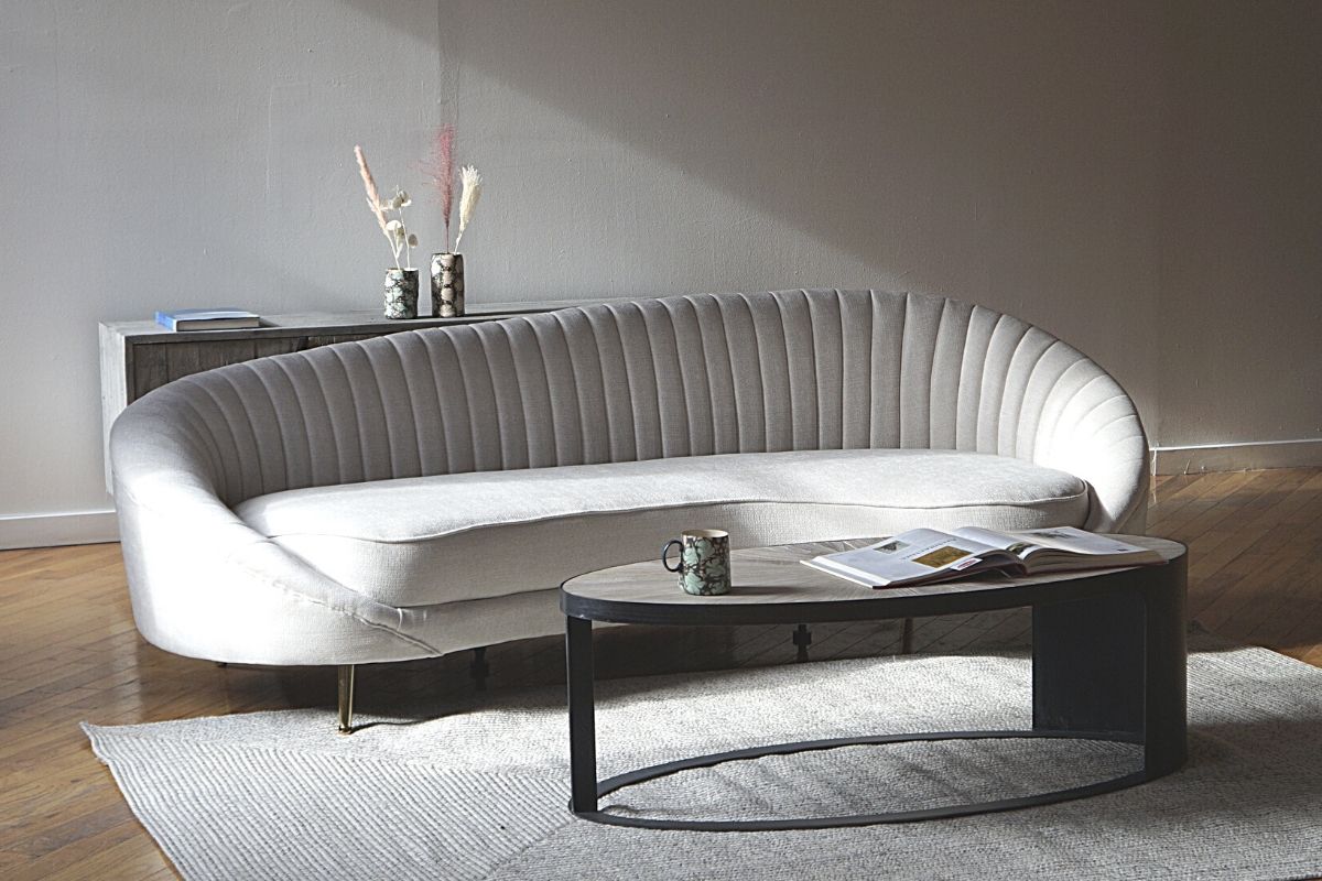 Modern white couch with coffee table - mid-century modern living room image