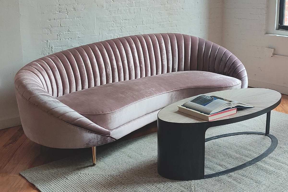 Curved pink velvet couch - mid-century modern design