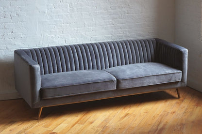 stately mic-century modern sofa in dark grey velvet