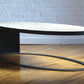 Eclipse elm and iron oval coffee table angled view, product image