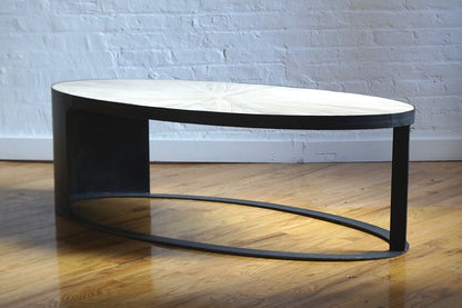 Eclipse elm and iron oval coffee table angled view, product image