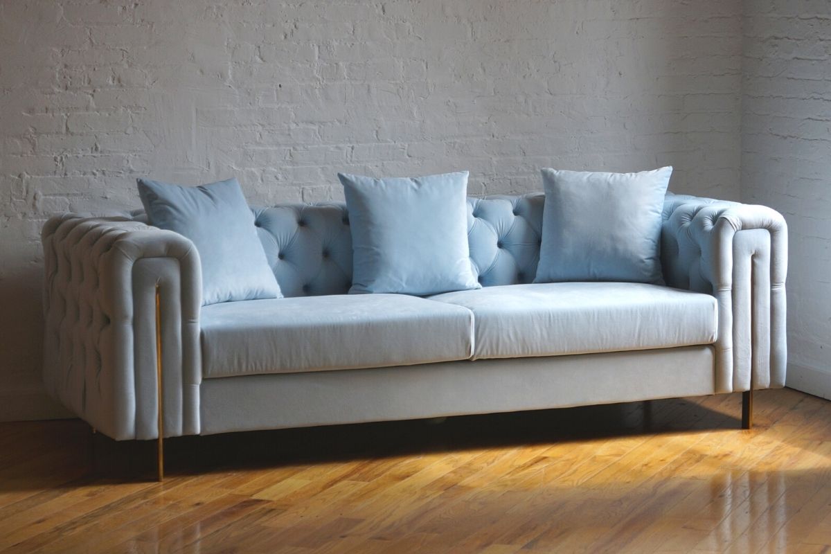 Song powder blue velvet couch with gold legs angled view, light blue velvet couch, tufted couch, modern couch, chesterfield couch, mid-century modern couch