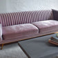 Stately pink velvet couch with beam coffee table, modern couch, mid-century modern couch, iridescent velvet couch staged image